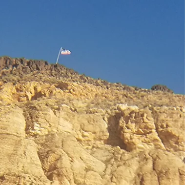 Tri state atv club raising flag on flag mountain view from down the mountain.
