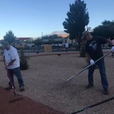 Tri state atv club wayside park project raking smooth rock landscaping.